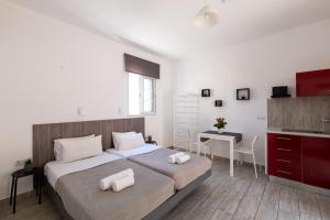 Postel nebo postele na pokoji v ubytování Pefkos View Apartments