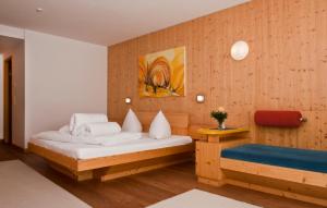 Voodi või voodid majutusasutuse Hotel Gasthof Handl toas