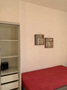 Postel nebo postele na pokoji v ubytování Pelini