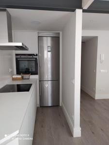Kuchnia lub aneks kuchenny w obiekcie Apartamentos Pontedeume Riadoeume