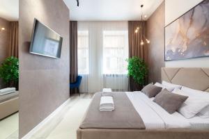 Cama o camas de una habitación en Avangard Franko* Art Apartment