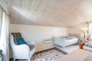 Cama ou camas em um quarto em Eika Cottage: Cozy, rural, spacious and well-equiped