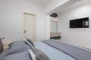 Postel nebo postele na pokoji v ubytování Villa Marina + 37 fotografií
