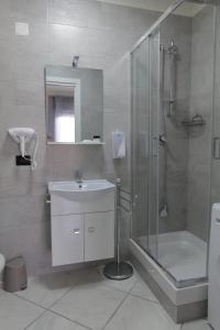 Et badeværelse på Albergo 3 Torri