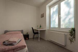 A bed or beds in a room at Hostel 26