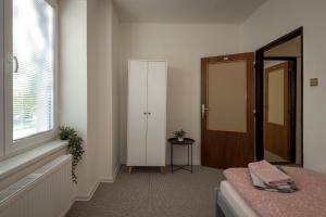 A bed or beds in a room at Hostel 26