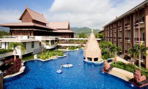 a resort pool with a water slide in the middle at Pullman Sanya Yalong Bay Villas & Resort in Sanya