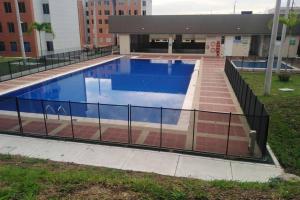 Apartamento acogedor con Piscina Excelente Sector 내부 또는 인근 수영장