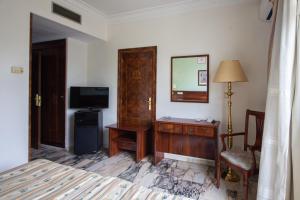TV a/nebo společenská místnost v ubytování Hotel Hidalgo