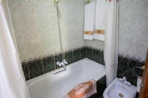 Koupelna v ubytování Hotel Hidalgo