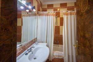 Koupelna v ubytování Hotel Hidalgo
