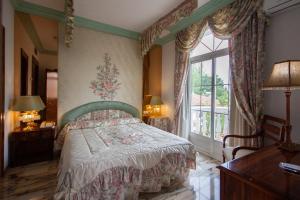 Postel nebo postele na pokoji v ubytování Hotel Hidalgo