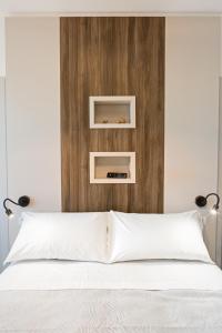 Postel nebo postele na pokoji v ubytování Enjoy Duomo - Flavio Baracchini 9 - Rooms