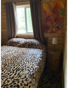 מיטה או מיטות בחדר ב-Golden Spot