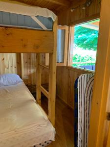Voodi või voodid majutusasutuse Mylooking vacanze Porlezza toas +37 fotot