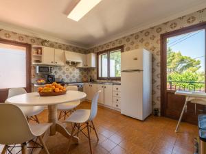Küche/Küchenzeile in der Unterkunft Villa Can Jeroni by Interhome