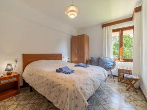 Ein Bett oder Betten in einem Zimmer der Unterkunft Villa Can Jeroni by Interhome