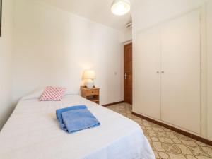 Ein Bett oder Betten in einem Zimmer der Unterkunft Villa Can Jeroni by Interhome