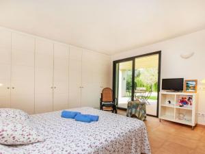 Cama o camas de una habitación en Holiday Home Empòrion by Interhome