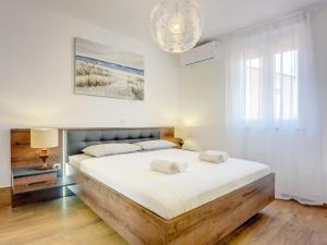 Posteľ alebo postele v izbe v ubytovaní Villa Noemi by Interhome