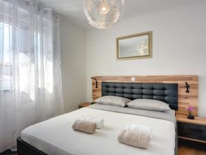 Posteľ alebo postele v izbe v ubytovaní Villa Noemi by Interhome