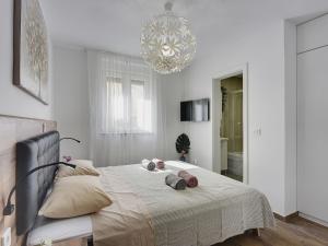 Posteľ alebo postele v izbe v ubytovaní Villa Noemi by Interhome
