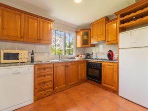 A kitchen or kitchenette at Villa Can Delfin Alcudia by Interhome