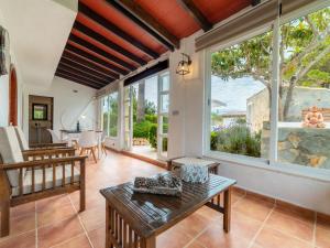 A seating area at Villa Can Delfin Alcudia by Interhome