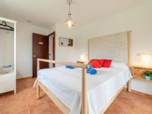 A bed or beds in a room at Villa Can Delfin Alcudia by Interhome