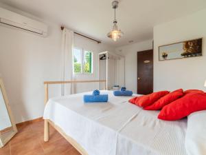 A bed or beds in a room at Villa Can Delfin Alcudia by Interhome
