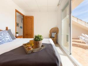 Ένα ή περισσότερα κρεβάτια σε δωμάτιο στο Holiday Home Jenaro by Interhome