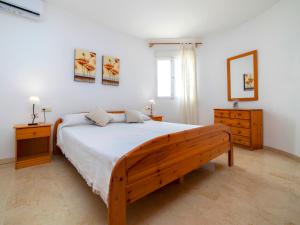 Łóżko lub łóżka w pokoju w obiekcie Holiday Home Villa Cassandra by Interhome