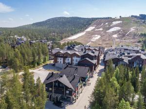 an aerial view of a resort with a mountain at Holiday Home Levin stara c15- 2 skipasses included by Interhome in Sirkka