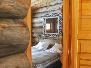 Postel nebo postele na pokoji v ubytování Holiday Home Kelo tuisku by Interhome