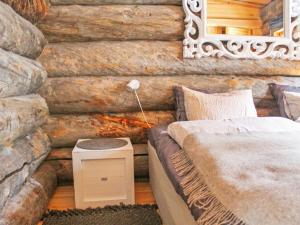 Postel nebo postele na pokoji v ubytování Holiday Home Kelo tuisku by Interhome
