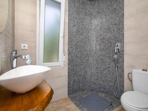 Koupelna v ubytování Holiday Home Nueva Playa-3 by Interhome