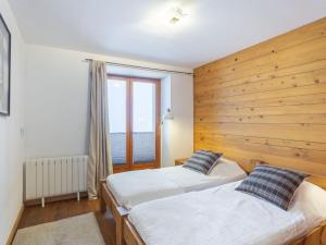 Katil atau katil-katil dalam bilik di Apartment La Trace Blanche by Interhome