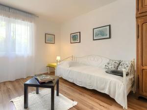 Postel nebo postele na pokoji v ubytování Apartment Laura by Interhome
