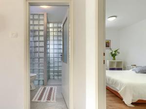 Postel nebo postele na pokoji v ubytování Apartment Laura by Interhome