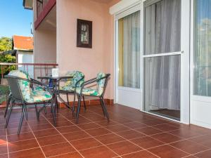 A balcony or terrace at Holiday Home Lampion by Interhome