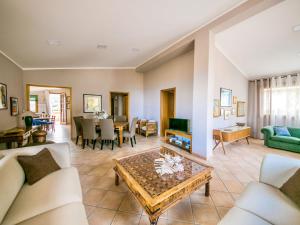 a living room with couches and a table at Apartment Bouganville di Patrizia by Interhome in Castellammare del Golfo