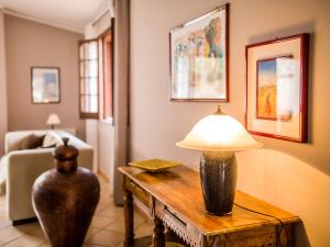 a living room with a table with a lamp on it at Apartment Bouganville di Patrizia by Interhome in Castellammare del Golfo +29 photos