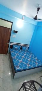 Кровать или кровати в номере Atithi Guest House