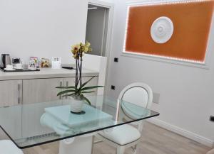 Kuchyň nebo kuchyňský kout v ubytování Boutique Hotel Paradiso Bovelacci