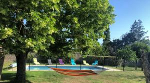 Taman di luar L'enclos bleu, gîte - marais poitevin avec piscine chauffée