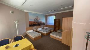 Postel nebo postele na pokoji v ubytování Penzion Florian + 37 fotografií