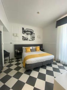 Posteľ alebo postele v izbe v ubytovaní Hotel Stabia