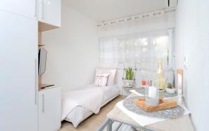 En eller flere senge i et værelse på Smart & Cozy - ZF Hvar