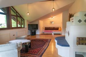 Posezení v ubytování Ferienwohnung Appartement Am Schilf XL