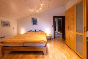 Postel nebo postele na pokoji v ubytování Ferienwohnung Appartement Am Schilf XL